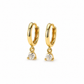 Pair of dainty gold huggie hoop earrings with small dangling round cubic zirconia charms on a clean white background. Minimal and elegant everyday jewelry with a polished gold finish and subtle sparkle.