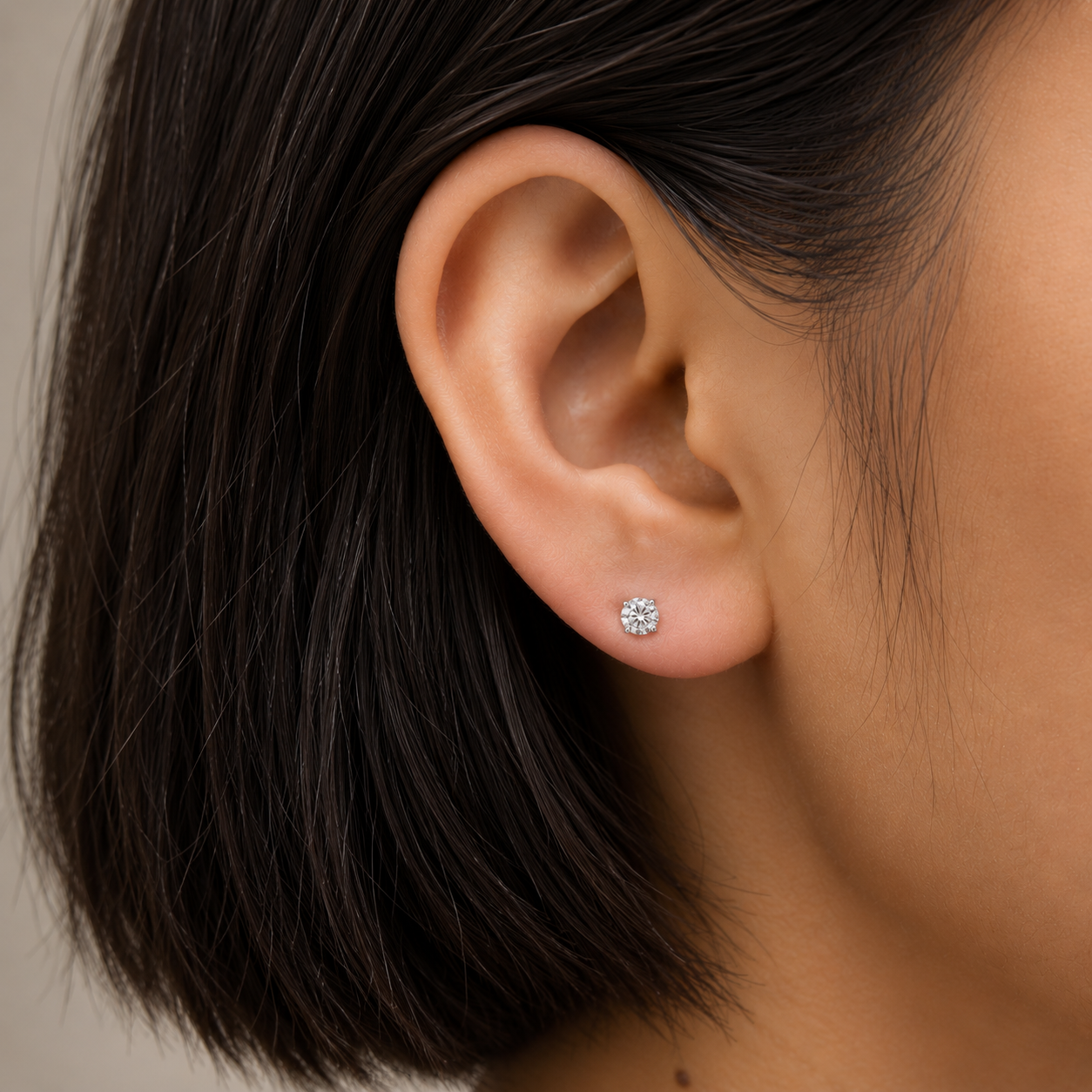 Sterling Silver 4MM CZ Stud Earrings Worn on Ears – Timeless Minimalist Jewelry