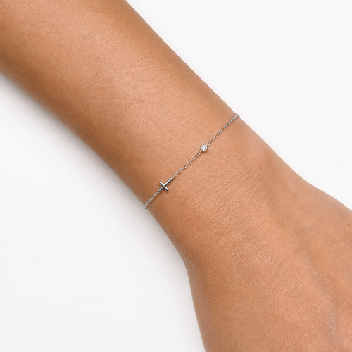 Sterling Silver Mini Cross Bracelet Worn on Wrist – Minimalist Christian Jewelry