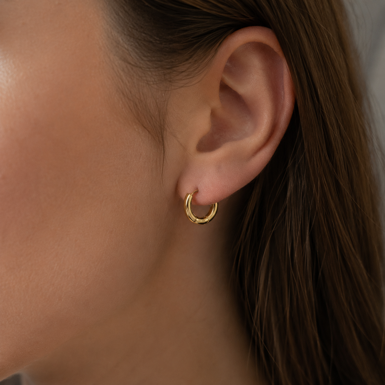 8MM Gold Vermeil Huggie Hoop Earrings Worn on Ears – Timeless Everyday Jewelry