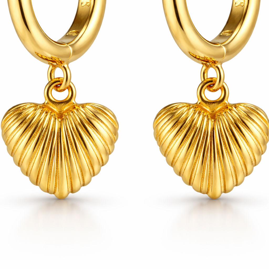 Close up of Shell Heart Shaped Dangling Earrings in 18K Gold Vermeil  2.5% Gold content