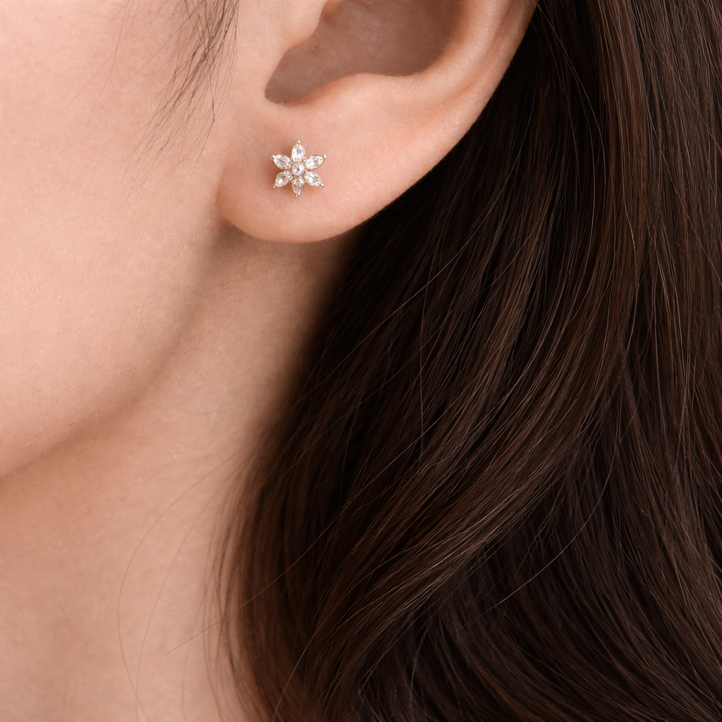 Flower Stud Sterling Silver Earrings worn on Ears
